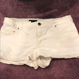 Cream jean shorts with lace trim